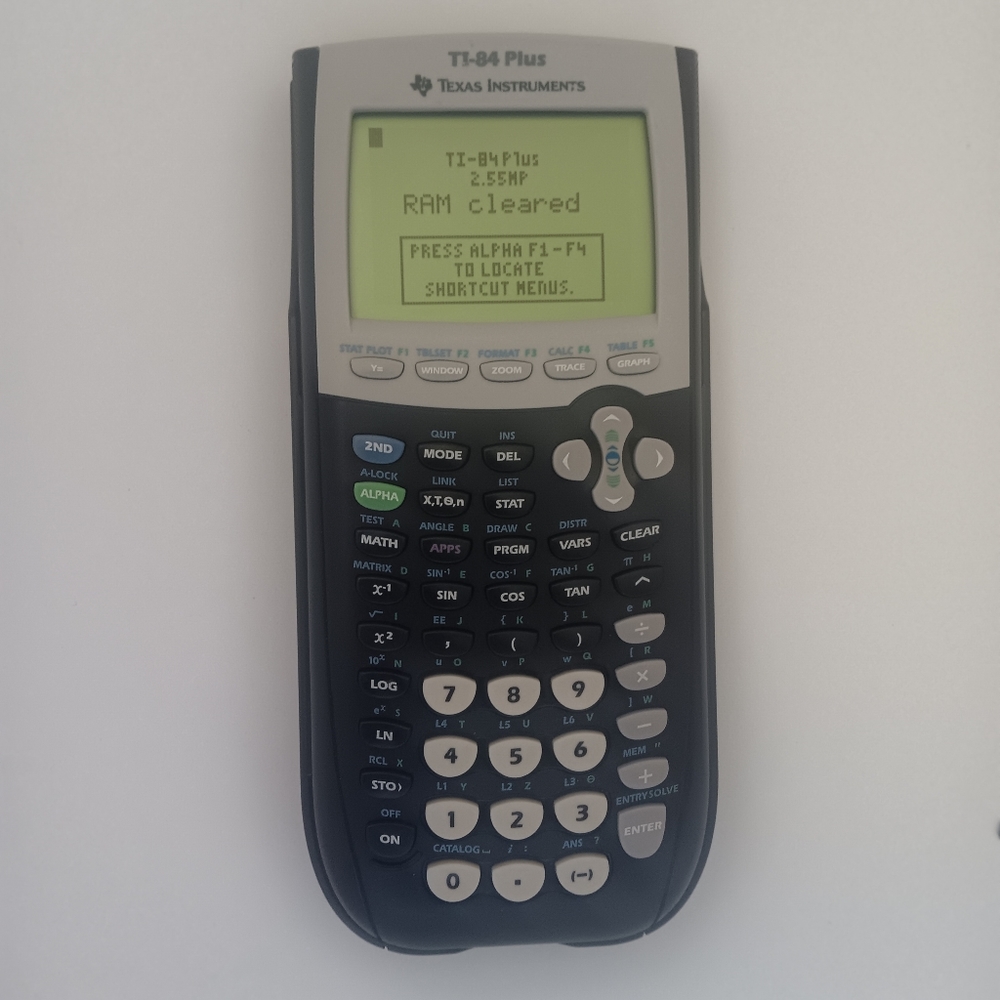Texas Instruments Ti-84 plus Graphing calculator with cover
